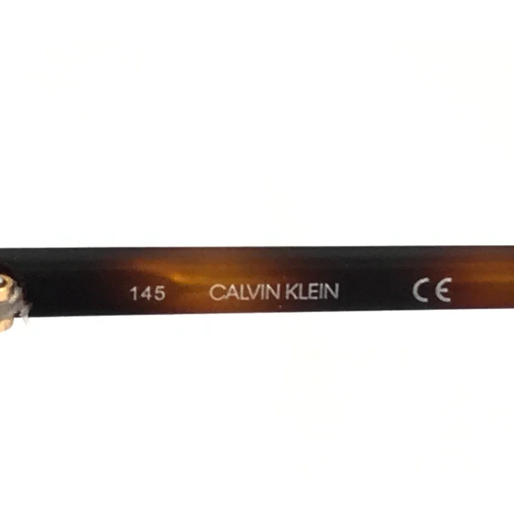 Calvin Klein Sunglasses CK20300S 717 Gold Tortoise Frames with Dark Brown Lenses